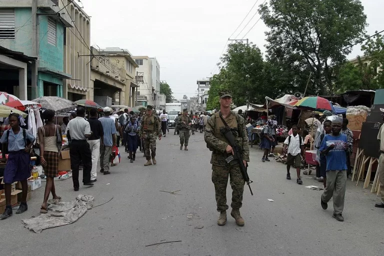 US Marine Corps (USMC) 2nd Marine Division patrol through the Bel Air area of Port-Au-Prince, Haiti. This Operation is known as SECURE TOMORROW