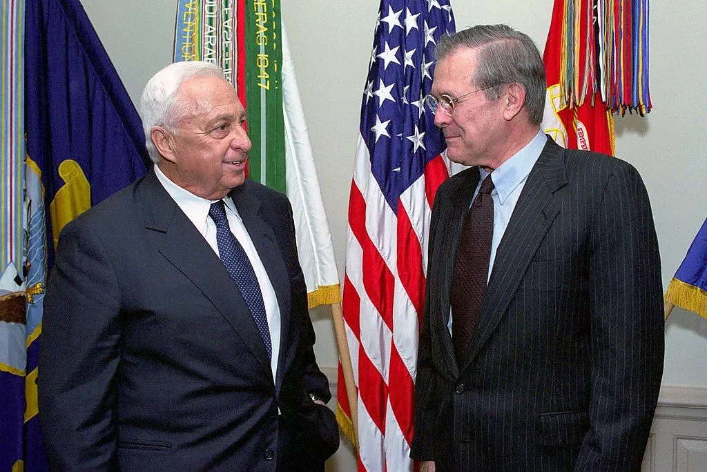 Donald H. Rumsfeld (right), U.S. Secretary of Defense, and Ariel Sharon, Israeli Prime Minister, pose for a picture at the Pentagon, Washington, D.C., Mar. 19, 2001