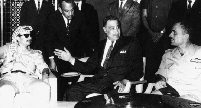 Egyptian President Gamal Abdel Nasser brokering an agreement to end the Black September conflict between Yasser Arafat (left) of the PLO and King Hussein (right) of Jordan. The negotiations are taking place at the Cairo Hilton 27 September 1970