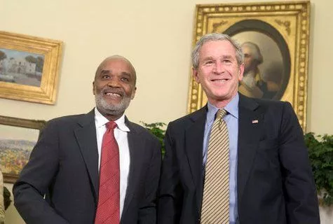 US President George W. Bush and President Rene Preval of Haiti stand in the Oval Office Tuesday, May 8, 2007