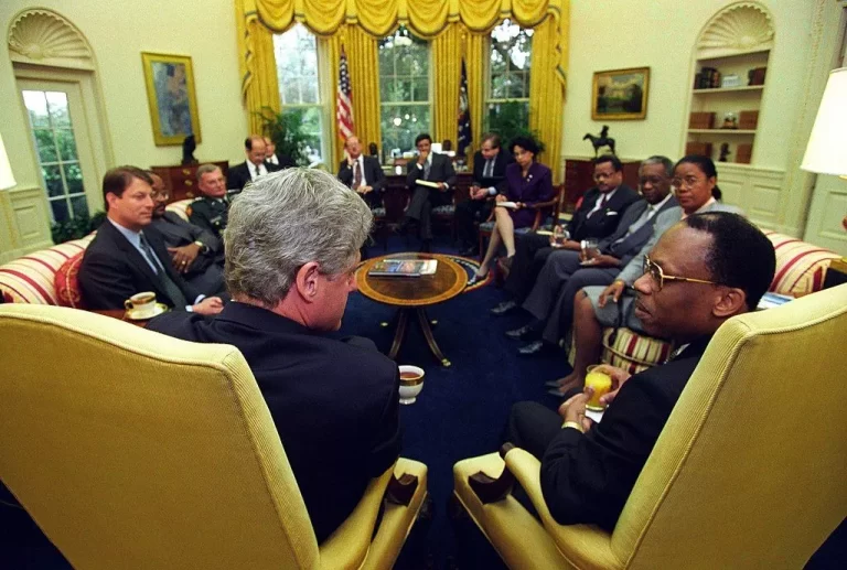 President Bill Clinton meets with President Jean-Bertrand Aristide of Haiti in the Oval Office 14 October 1994