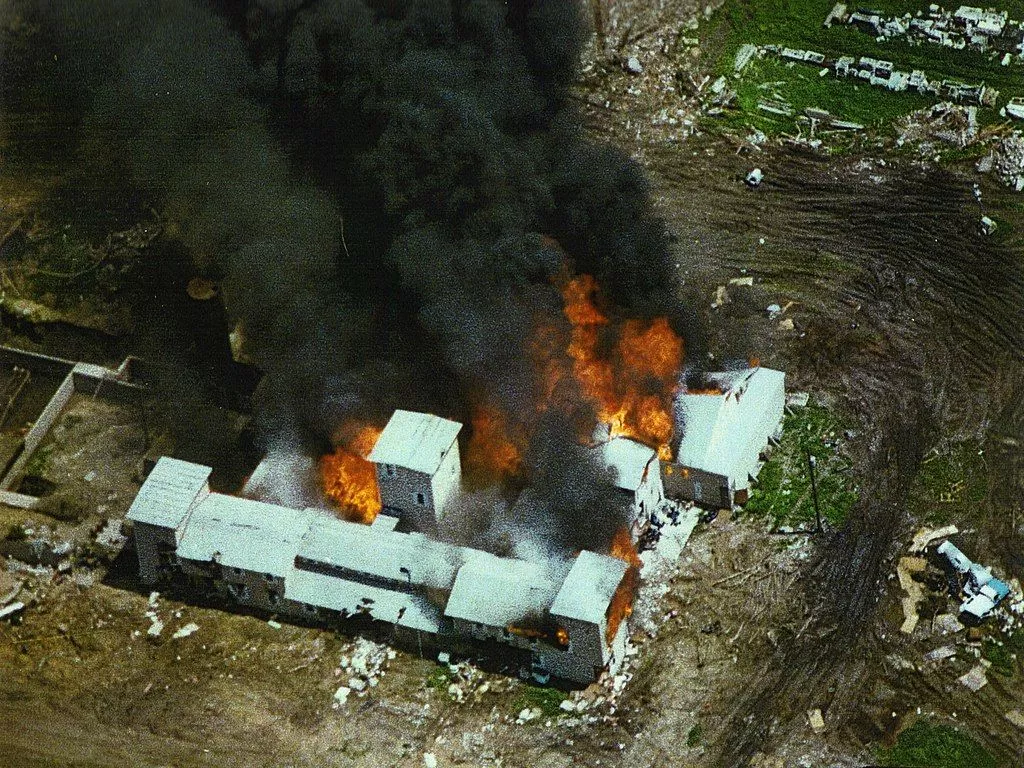 Aerial view of Branch Davidian compound near Waco, Texas, in flames on April 19, 1993, following a 51-day siege by the FBI and law enforcement