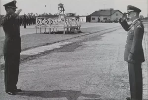 Lt. Col. Corso (right), Inspector General of the 7th Army, is seen visiting an army helicopter base in Germany