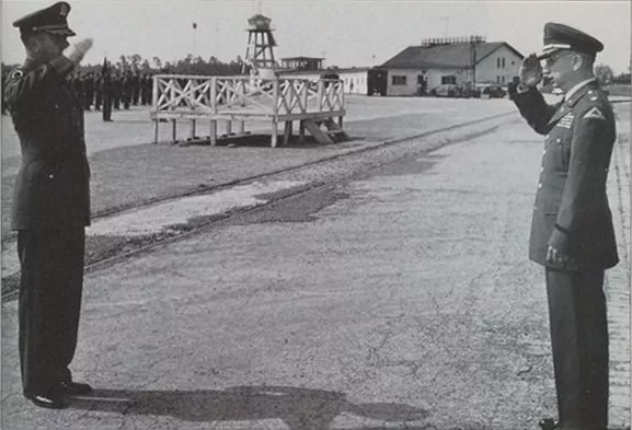 Lt. Col. Corso (right), Inspector General of the 7th Army, is seen visiting an army helicopter base in Germany