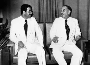 Iraqi President Ahmed Hassan al-Bakr, right, and Saddam Hussein are pictured in Baghdad in this November 1978 Photo