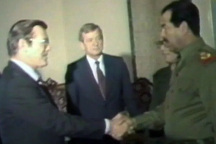 Saddam Hussein greets Donald Rumsfeld, then special envoy of President Ronald Reagan, in Baghdad on December 20, 1983