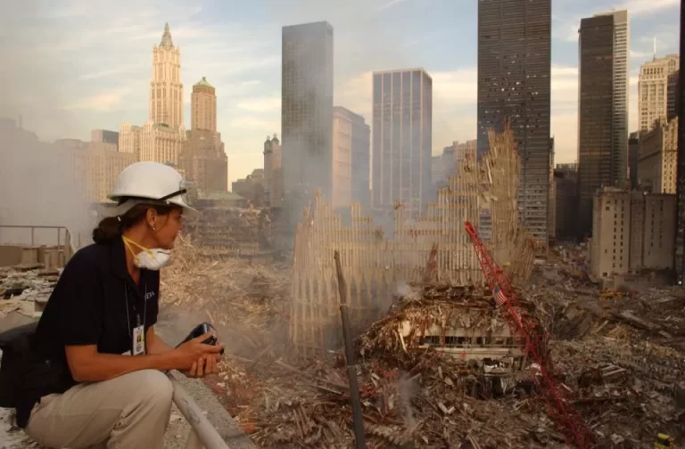 FEMA PHOTOGRAPHER ANDREA BOOHER AT GROUND ZERO, FALL 2001. PHOTOGRAPH BY DOUG WELTY, FEMA