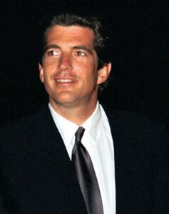 John F. Kennedy Jr. greets invited guests at the HBO and Imagine Entertainment premiere