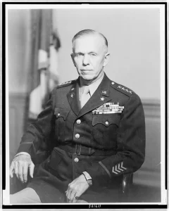 George Catlett Marshall, half-length portrait, seated, facing slightly left, in uniform