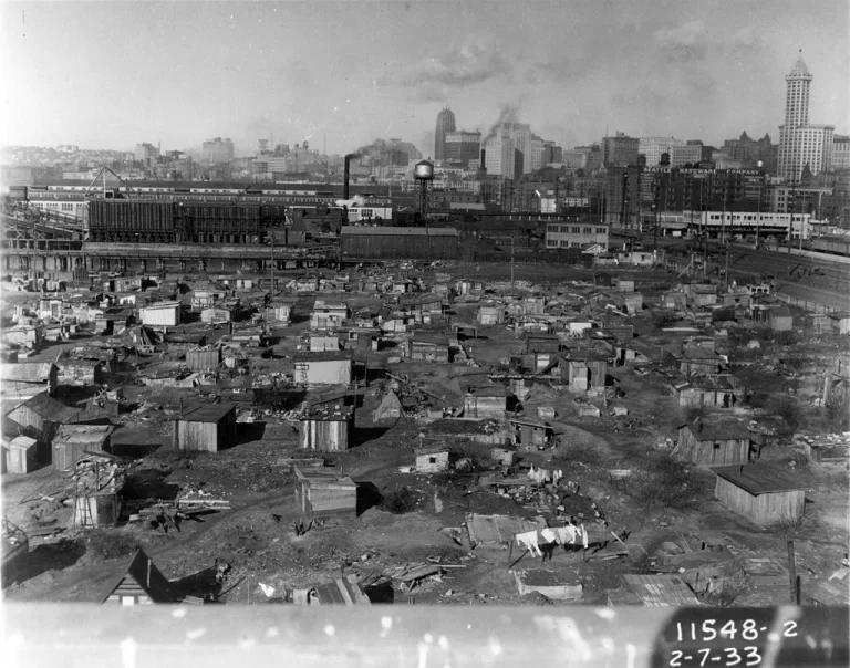 Hooverville on the Seattle tideflats, Seattle, Washington, U.S., 1933. Point of view is at the foot of Atlantic St. near the Skinner and Eddy Shipyards.