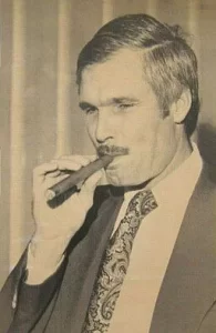 Ted Turner smoking a cigar December 1976