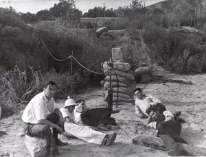 In the Arroyo Seco; seated left to right: Rudolph Schott, Apollo Milton Olin Smith, Frank Malina (white shirt, dark pants), Ed Forman and Jack Parsons (right, foreground) - in 1936.