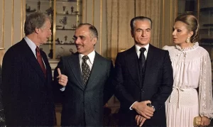 President Jimmy Carter with King Hussein of Jordan, the Shah (King) of Iran, and Shahbanou (Queen) Farah Pahlavi of Iran.