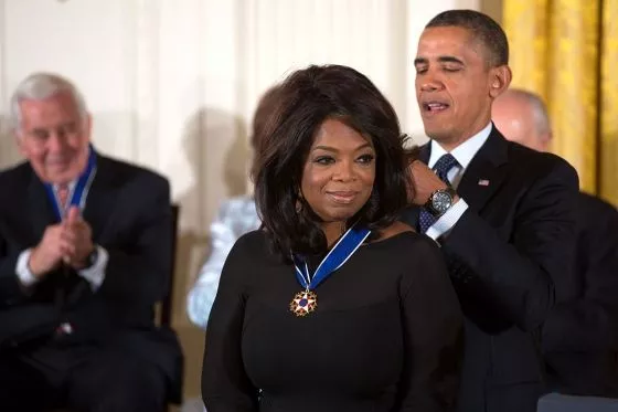 President Barack Obama awards the 2013 Presidential Medal of Freedom to Oprah Winfrey during a ceremony in the East Room of the White House, Nov. 20, 2013.