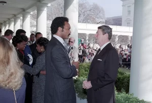 English: President Ronald Reagan Meeting with Jesse Jackson and Lieutenant Andrew Goodman Who Was Captured on December 4, 1983 During a Bombing Raid Against Syrian Antiaircraft Positions in Lebanon on The Colonnade, 1/4/1984