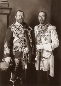 Cousins Nicolas II (dark uniform), last Russian czar and George V (light uniform), first British king of the Windsor dynasty, Berlin, 1913