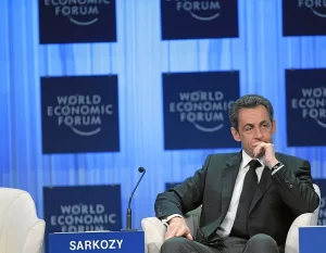 Nicolas Sarkozy, President of France, is listening during the speech of Klaus Schwab, Founder and Executive Chairman, World Economic Forum