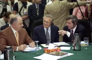 US Secretary of Defense Donald H. Rumsfeld, center and Ambassador L. Paul Bremer, right, meet with Iyad Hashim Allawi, former President of the Interim Council of Ministers and the Iraqi Governing Council members in support of Operation IRAQI FREEDOM