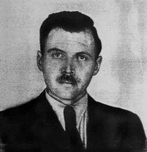 Josef Mengele (1911-1979), German SS officer. Photo taken by a police photographer in 1956 in Buenos Aires for Mengele's Argentine identification document