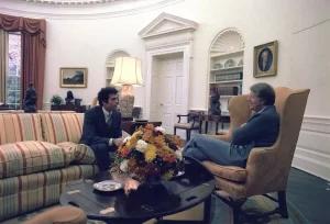 immy Carter meets with Jack Watson, cabinet secretary, in the Oval Office