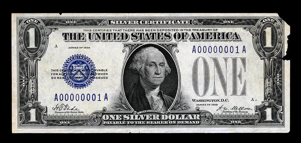 The very first small size issued $1 bill (1928). Signatures of Harold Theodore Tate and Andrew W. Mellon.