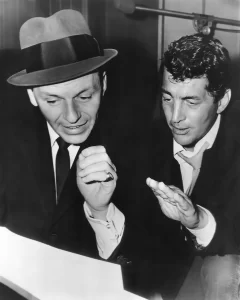 Publicity photo of Frank Sinatra and Dean Martin in a recording studio