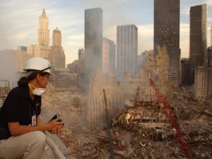 FEMA PHOTOGRAPHER ANDREA BOOHER AT GROUND ZERO, FALL 2001. PHOTOGRAPH BY DOUG WELTY, FEMA