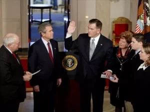 As President George W. Bush watches, Vice President Dick Cheney swears in Tom Ridge as the Secretary of the Department of Homeland Security in the Cross Hall Jan. 24, 2003. Secretary Ridge's wife, Michele, and children, Tom and Lesley, hold the Bible during the administering of the oath. "In October of 2001, when I established the office -- the White House Office of Homeland Security -- I knew immediately that Tom was the right man for the assignment. He's a decisive, clear-thinking executive who knows how to solve problems. He's a person of integrity and a person of good judgment," said the President in his remarks.