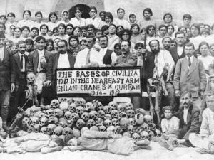 Skulls of Armenians massacred in Urfa, surrounded by Armenian dignitaries and women from the women's shelter in Urfa's Monastery of St. Sarkis in June 1919